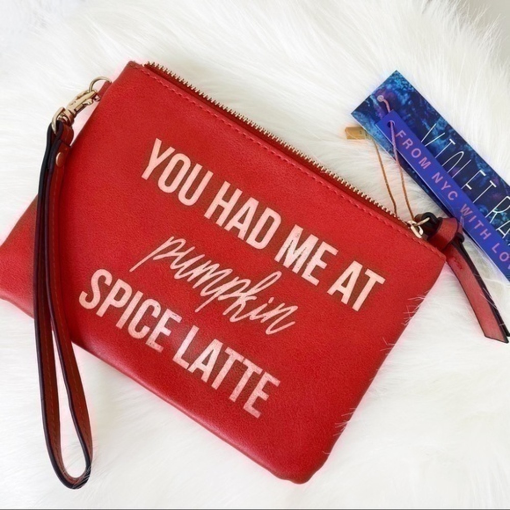 NWT orange faux leather wristlet